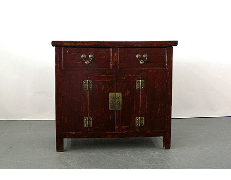 An unusual dark-brown lacquer small country-style table cabinet