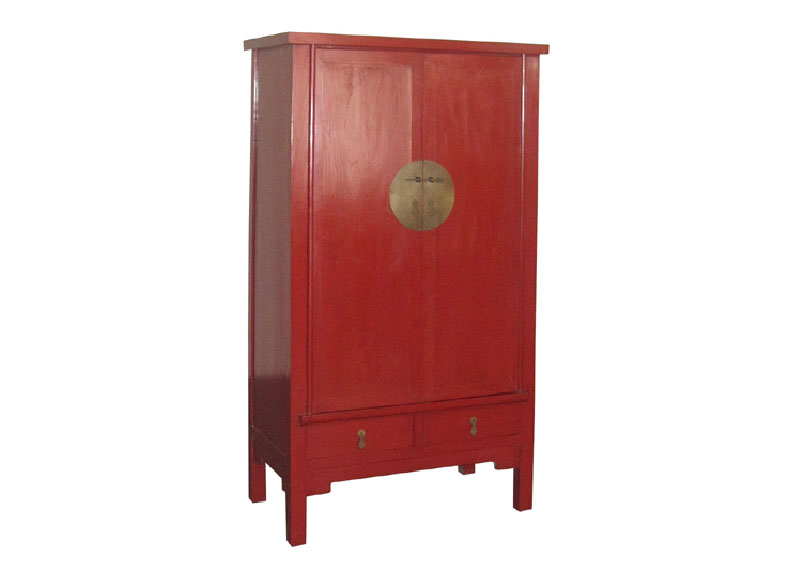 A large Chinese red-lacquer cabinet / armoire