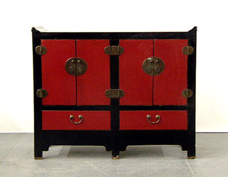 An unusual Chinese red-lacquer sideboard / double-chest (Tiantigui)